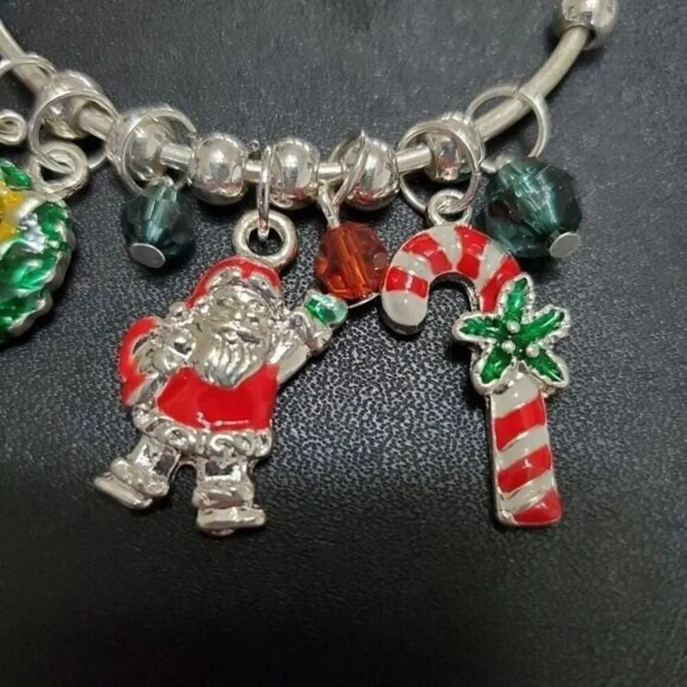 Silver tone child's holiday charm bracelet 6.25